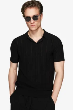 Black perforated knit polo shirt
