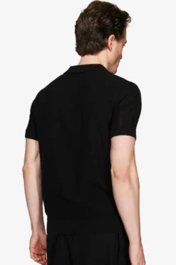 Black perforated knit polo shirt