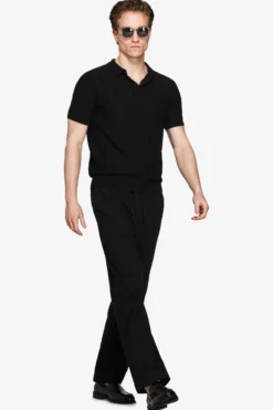 Black perforated knit polo shirt