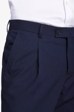 Blue classic trousers with pleats