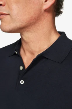 Blue knit polo shirt
