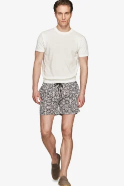 Dark brown ethnic print swim trunks