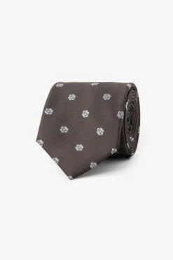 Dark brown floral design tie