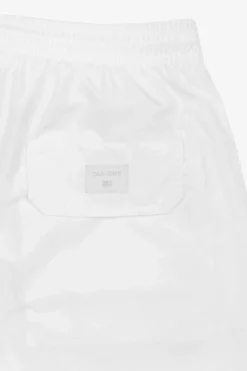 DNJ cream swim trunks