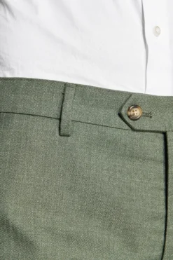 Green slub fabric trousers