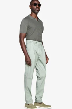 Green textured knit polo shirt
