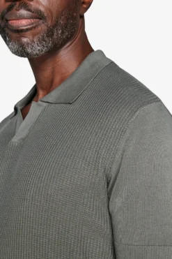 Green textured knit polo shirt