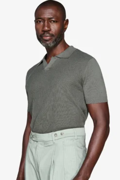 Green textured knit polo shirt