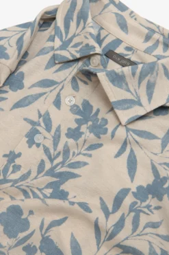 Light blue flower pattern piquet polo shirt