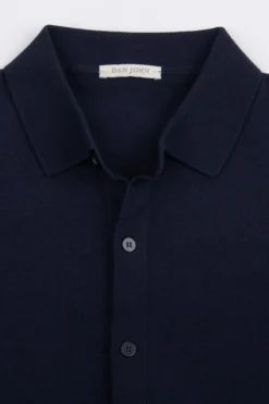 Navy short sleeved knit shirt