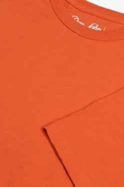 Orange crew-neck T-shirt with chest pocket