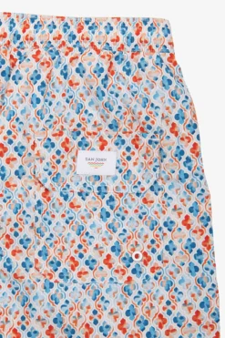 Orange lily print swim trunks