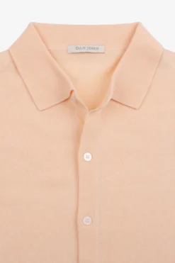 Peach short sleeved knit shirt