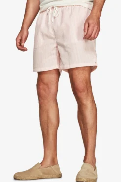 Pink striped seersucker swim trunks