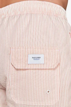 Pink striped seersucker swim trunks