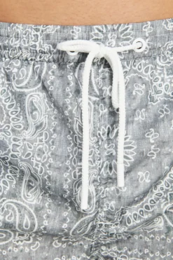 Sage floral print swim trunks