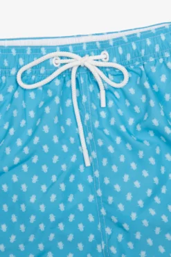 Turquoise penguin print swim trunks