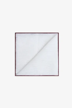 White pocket square with contrasting burgundy border